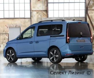 Volkswagen Caddy — вид сбоку