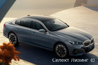 Электрический седан BMW i5 кузов G68 вид спереди BMW i5 вид спереди