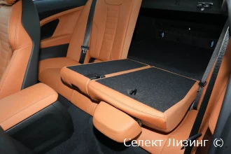 Задний ряд сидений спортивного купе BMW M2 G87 салон BMW M2 G87 салон